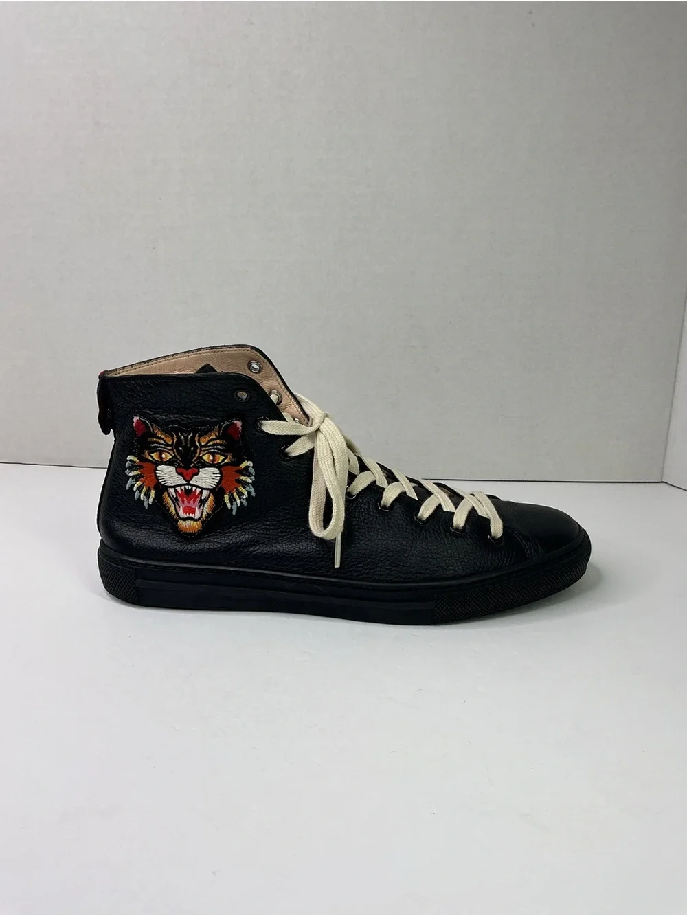 Gucci black leather high-top sneakers